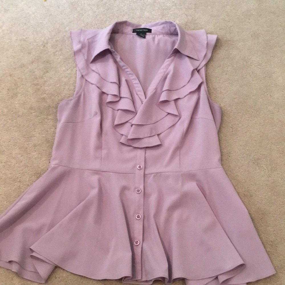 Sleeveless, ruffled, peplum blouse